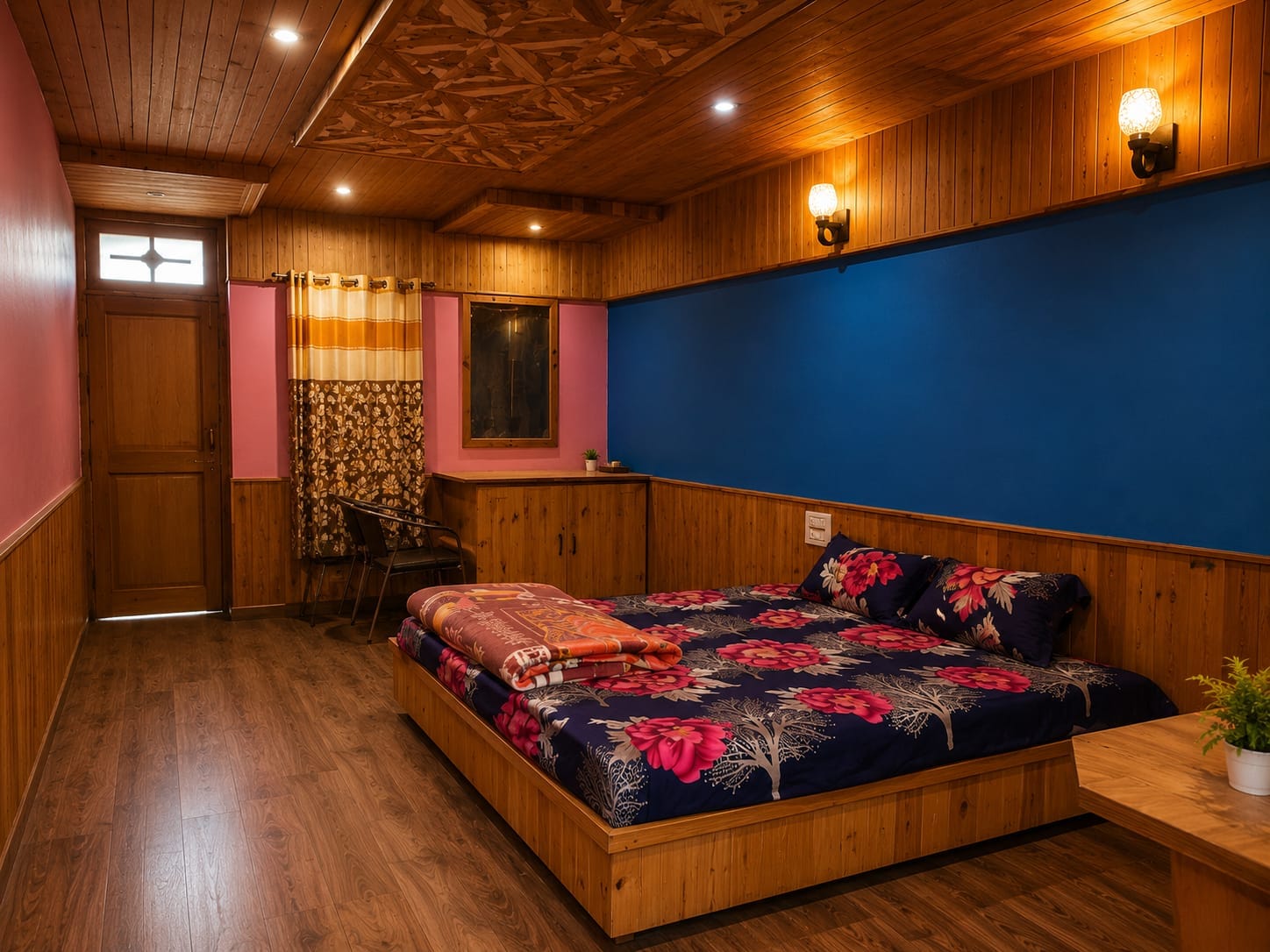 Bedroom with colourful bedding at Sunset Homestay